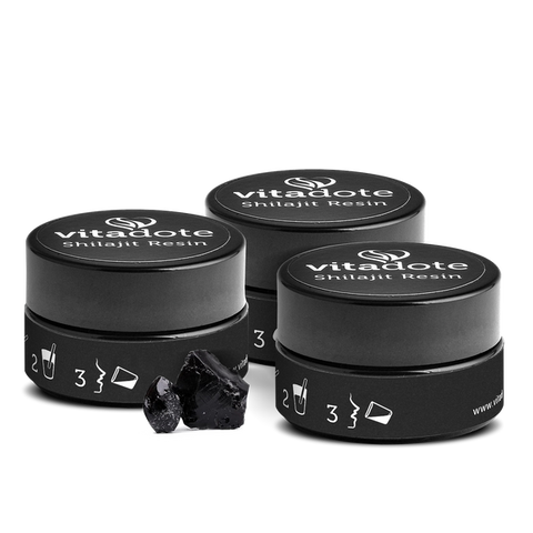 Three containers of vitadote Shilajit Resin on a white background