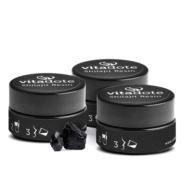 Three containers of vitadote Shilajit Resin on a white background